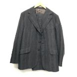 An Aquascutum single breasted light check suit, approx. 40" chest