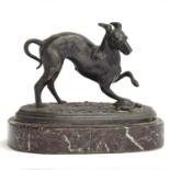 A small bronze of a leaping whippet playing with a tortoise, on a marble base, 12cm long