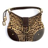 A Dolce & Gabbana leopard print handbag with COA