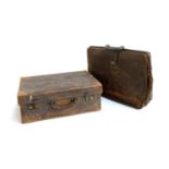 A vintage leather suitcase, 51cmW, with silk lined interior; together with a large leather