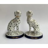 A pair of Italian Staffordshire style dogs, with spot decoration, each approx. 24.5cmH