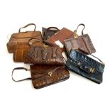 A mixed box of vintage alligator skin handbags, some faux, including a 1930s Sienna brown