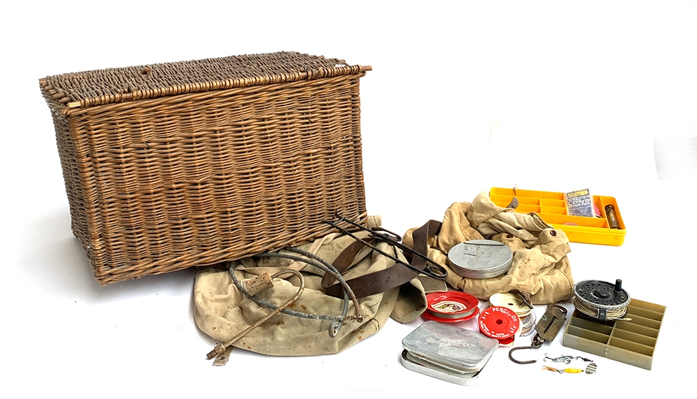 A vintage wicker fishing creel, 50x30x35, together with two canvas fishing bags, alloy cast boxes,