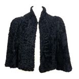 A small lambs wool bolero jacket, size 6-8