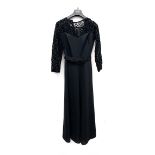 A Toplet black evening dress, size 10; together with one other (2)