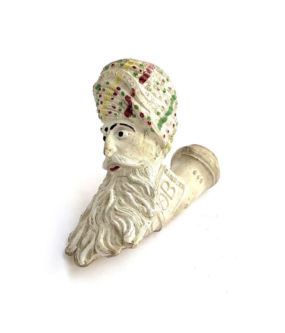 A French Gambier mould clay pipe in the form of 'Jacob', heightened in colour enamels, no. 948