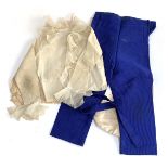 A pair of page boy trousers together with two jackets, each with lace collars and trim, and a pair o