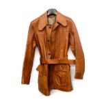 A 1970s brown leather jacket with belt, from Lord John of London; together with a single breasted