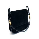 A black suede Gucci handbag, with dust bag