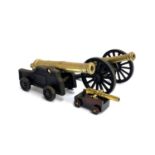 Three brass and cast iron miniature canon