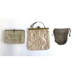 A sterling silver mesh purse, together with two other evening purses with gilt metal decoration (3)