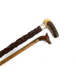 A substantial walking stick with plated collar and antler handle; together with one other with