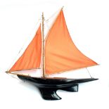 A gaff rigged pond yacht with lead keel, 80cm long, approximately 84cm high