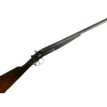 An Army & Navy 12 bore side by side nito proof hammer gun, S/N 44039, length of barrel 30"