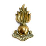 A Royal Artillery brass crest, 18cm high