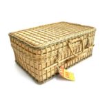 A vintage wicker picnic hamper