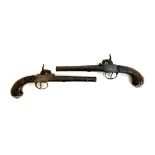 A pair of 19th century percussion duelling pistols, each having a 17cm Queen Anne type cannon