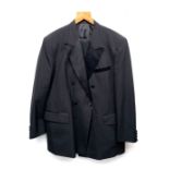 A double breasted dinner jacket and trousers, tailors by Bobbies Fashions Hong Kong; together with a