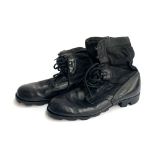 A pair of army jungle boots size 10R