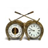 A French gilt metal clock/barometer pair, surmounted by fox mask, two brushes, and crossed whips,
