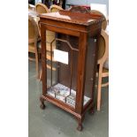 A glazed display cabinet, with two glass shelves, 54x30x105cmH