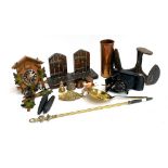 A mixed lot to include bookends, cuckoo clock, Kodak junior bellows camera, cast iron shoe slob,