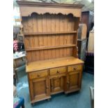 A modern kitchen dresser 126x47x204cmH