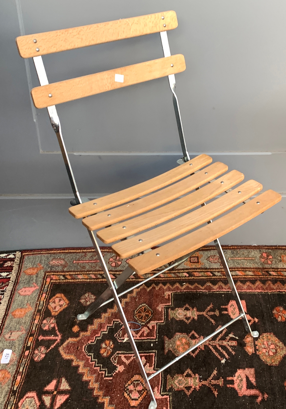 A Habitat beechwood and metal folding garden chair