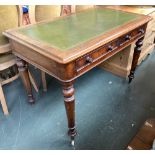 A 19th century mahogany writing desk with green leather skiver, over two frieze drawers, on tapering