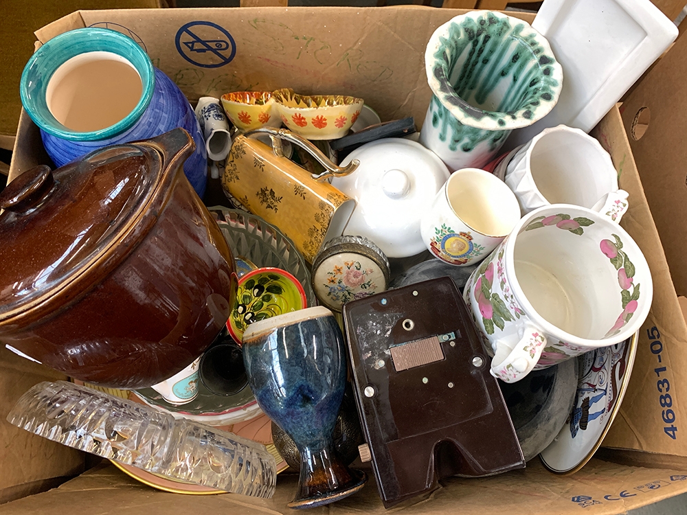 A large mixed lot of ceramics to include vases, planters, kitchenware etc