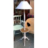 A white painted tripod standard lamp with dish shelf, 142cmH