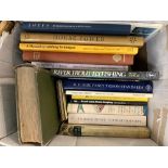 A small box of books on the subject of natural history and fishing