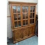 A modern glazed dresser, with parquetry style doors, 140cmW