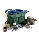 A fishing tackle box, Mustad rod bag, four sea fishing reels: Pflueger Sea King, Pen 160, Pen