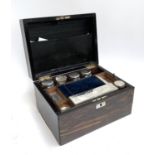 A Victorian coromandel travelling vanity set, with fitted interior and side drawer, 31x23x18cmH