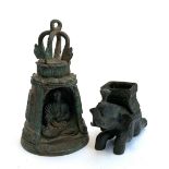 A cast metal elephant together with a monk within a bell, 23cmH