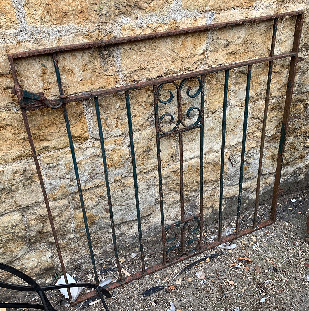 A wrought iron garden gate, 104x101cm