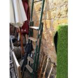 A decorators ladder; together with a number of drain rods with attachments