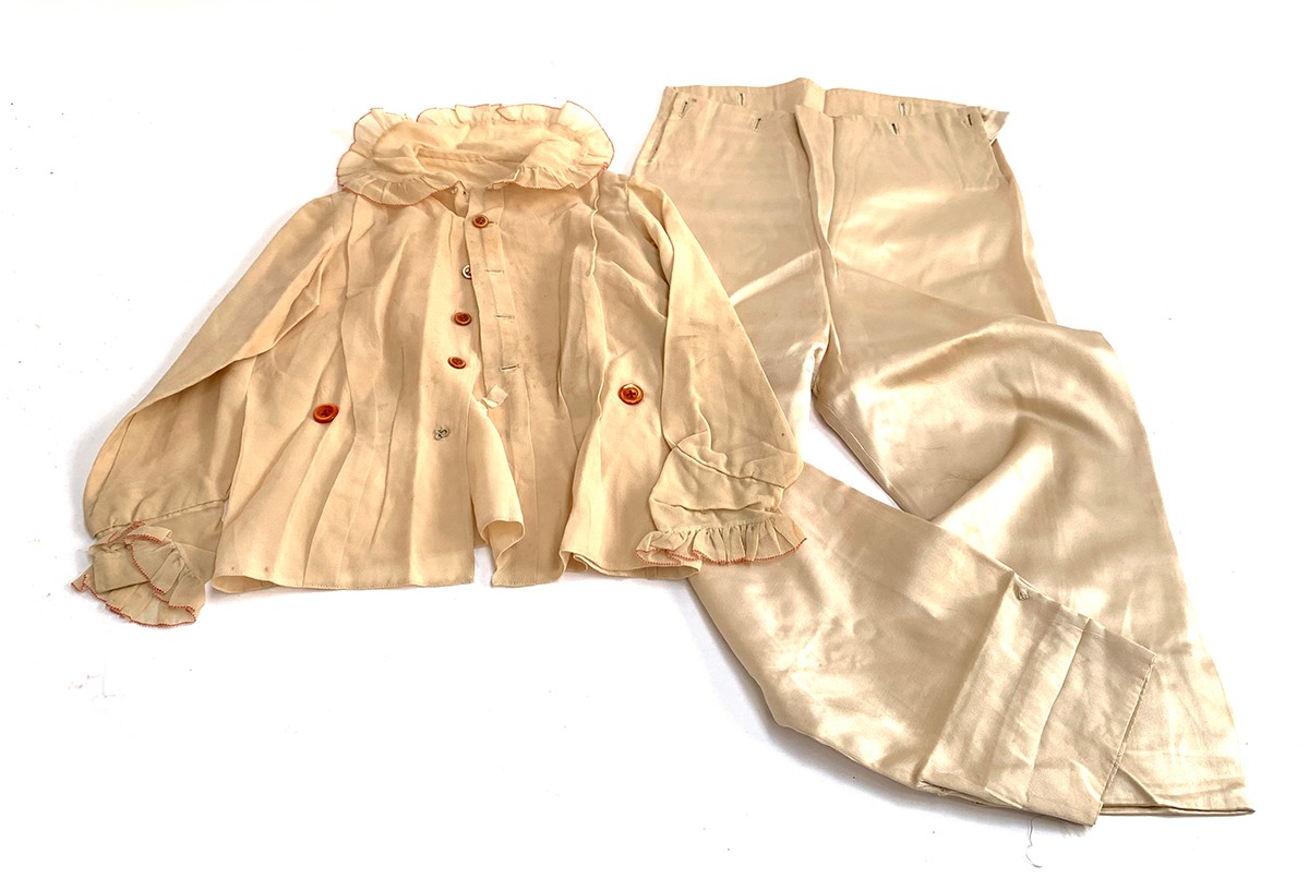 A pair of page boy trousers together with two jackets, each with lace collars and trim, and a pair - Image 2 of 2