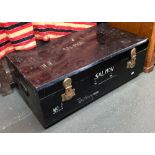 A black painted metal travel trunk, with loop carry handles, marked Salmon No.3, 92cmW