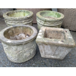 Four various composite stone garden planters