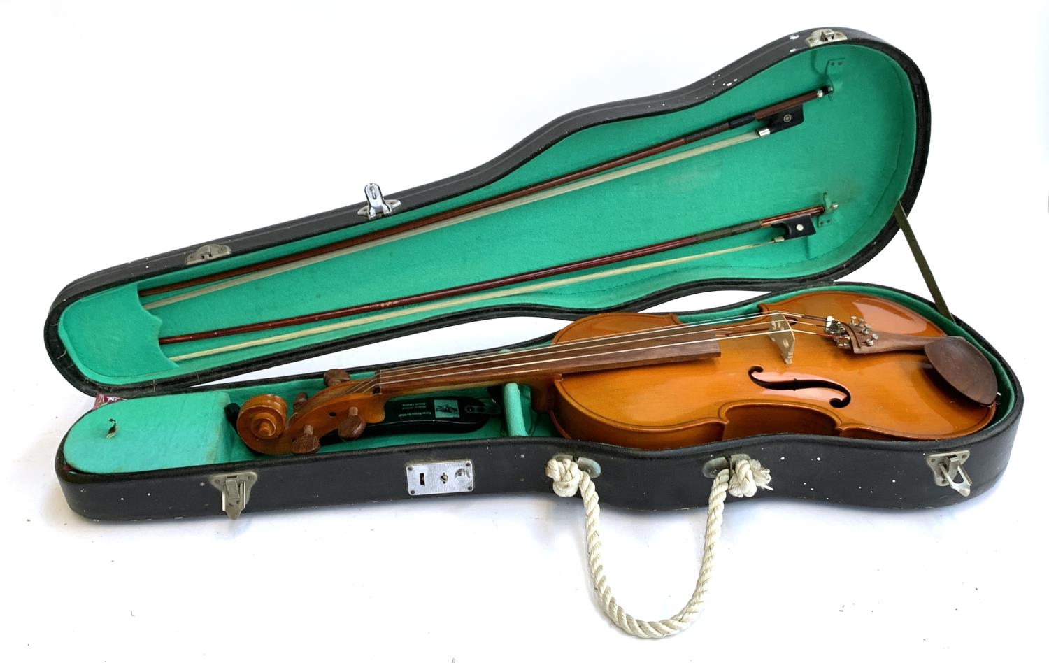 A full sized viola; together with two bows and a quantity of music