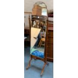 A 20th century cheval mirror with bevelled glass, 164cmH