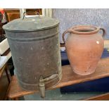 A large vintage metal water butt with tap; together with a twin handled terracotta storage jar