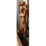 A carved African figure of a lady with basket, 97cmH