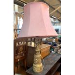 A giltwood style table lamp, with large pink shade, 83cmH total height