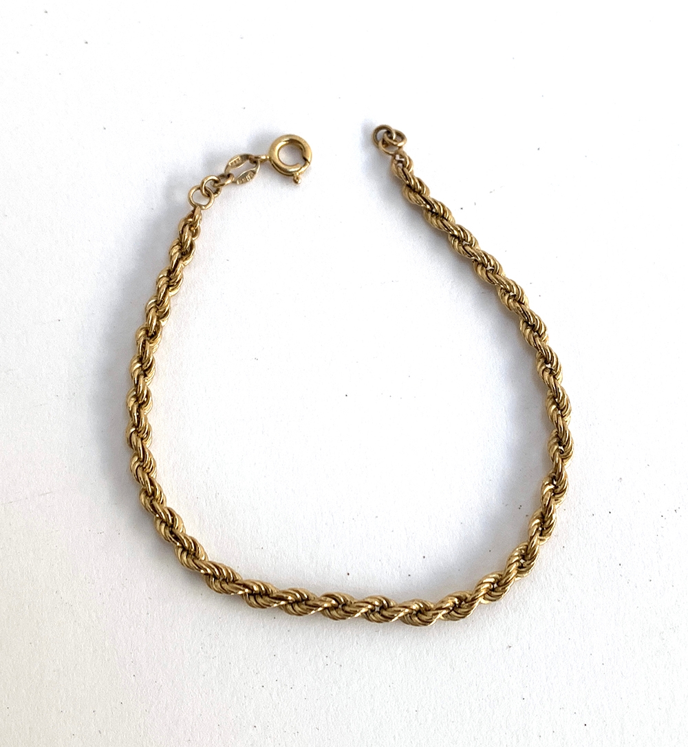 A 9ct gold ropetwist bracelet, 18.5cmL, approx. 1.8g; together with a 9ct gold teapot charm, approx. - Image 2 of 2