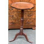 A Regency mahogany tripod table, dish top, on turned column and cabriole legs (missing moulding