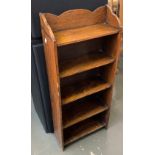 A small narrow oak bookshelf of five shelves, 38cmW