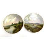 A pair of Coalport hand painted Plates, ?Heather? and ?The Weir?, 22.5cmD